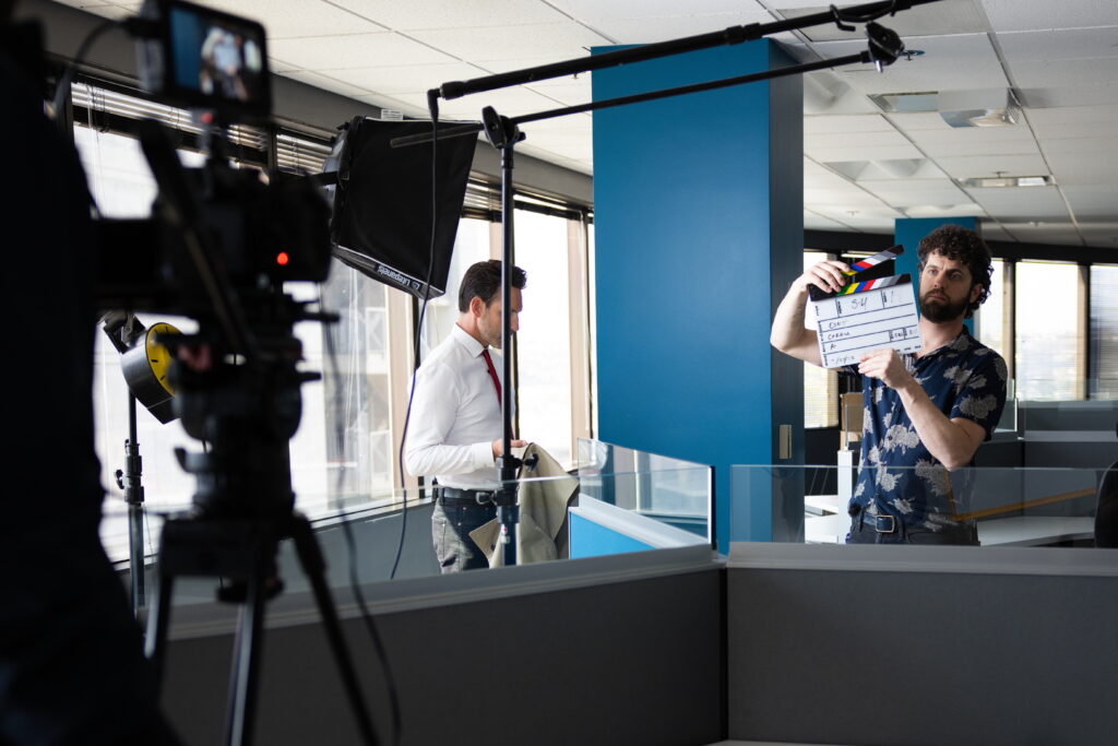 Behind the scenes filming a scientist in a lab for a life science video production.