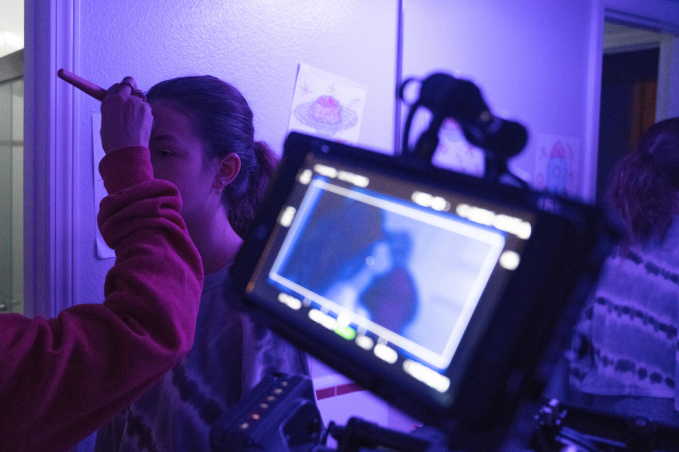 Makeup artist preparing on-camera talent during a brand film production in San Diego