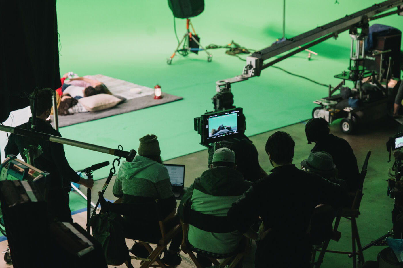 Film crew and jib on a green screen stage during a broadcast commercial shoot in San Diego